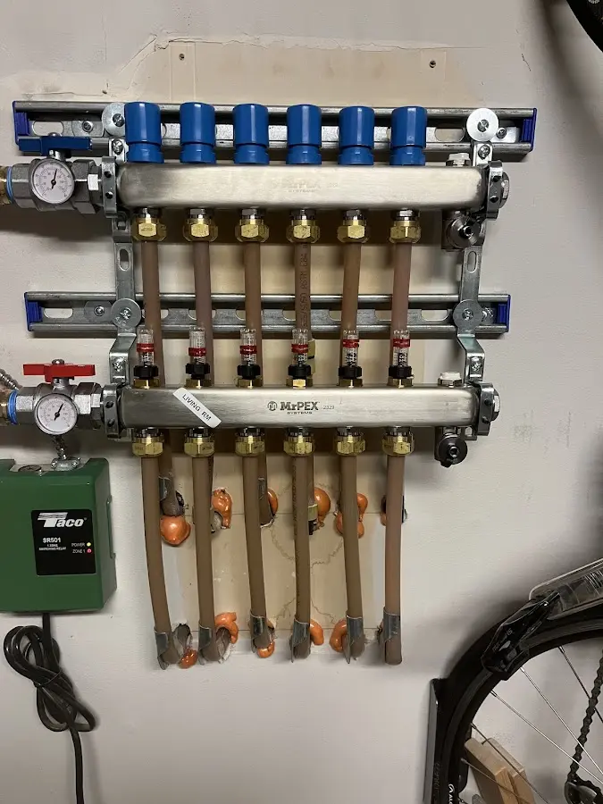 Plumber performing Water Heater Repair at a residential property in Ravenna